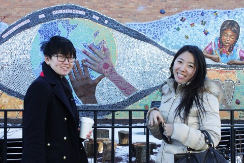 It looks like the hand in the back is caressing Xixi's face