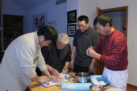 Three dads and a grandpa hard at work